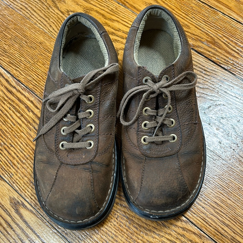 Dr. Martens brown leather John style shoes. Lug sole.  Lace up. Size 10.